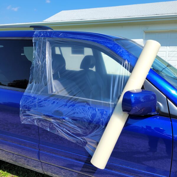 Crash Sealing Film Roll in use on a car's front window